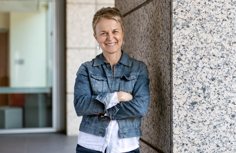 Melanie Ott standing in front of Gladstone Institutes